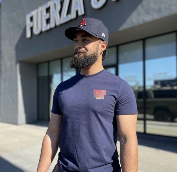 Tony Lozano stands outside his gym. 