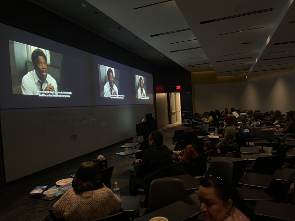 The audience watches Coleman Domingo on three screens during the “Rustin” event. 