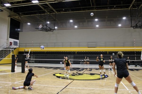  Players on the Cal State LA women's volleyball team practice at the University Gym on August 22, 2024. 