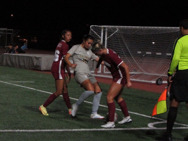 Shelby Melin fights for possession during Cal State LA's 4-2 victory against Westmont on Thursday, Sept. 5, 2024.