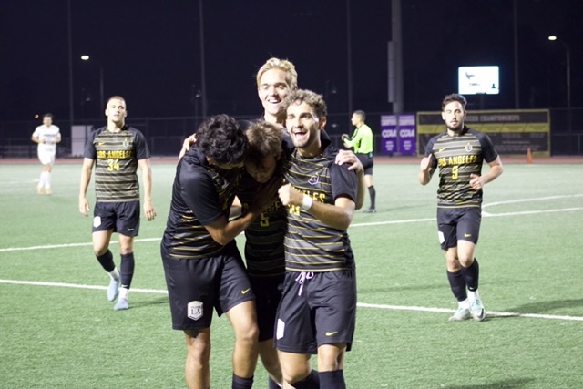 Golden Eagles celebrate goal by Luke Varav (pictured middle) with hugs at the Sept. 20 game versus Colorado School of Mines.