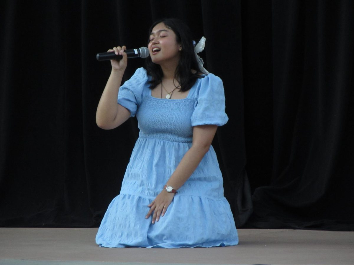 Reine Saavedra, 1st place winner singing Goddess by Laufey