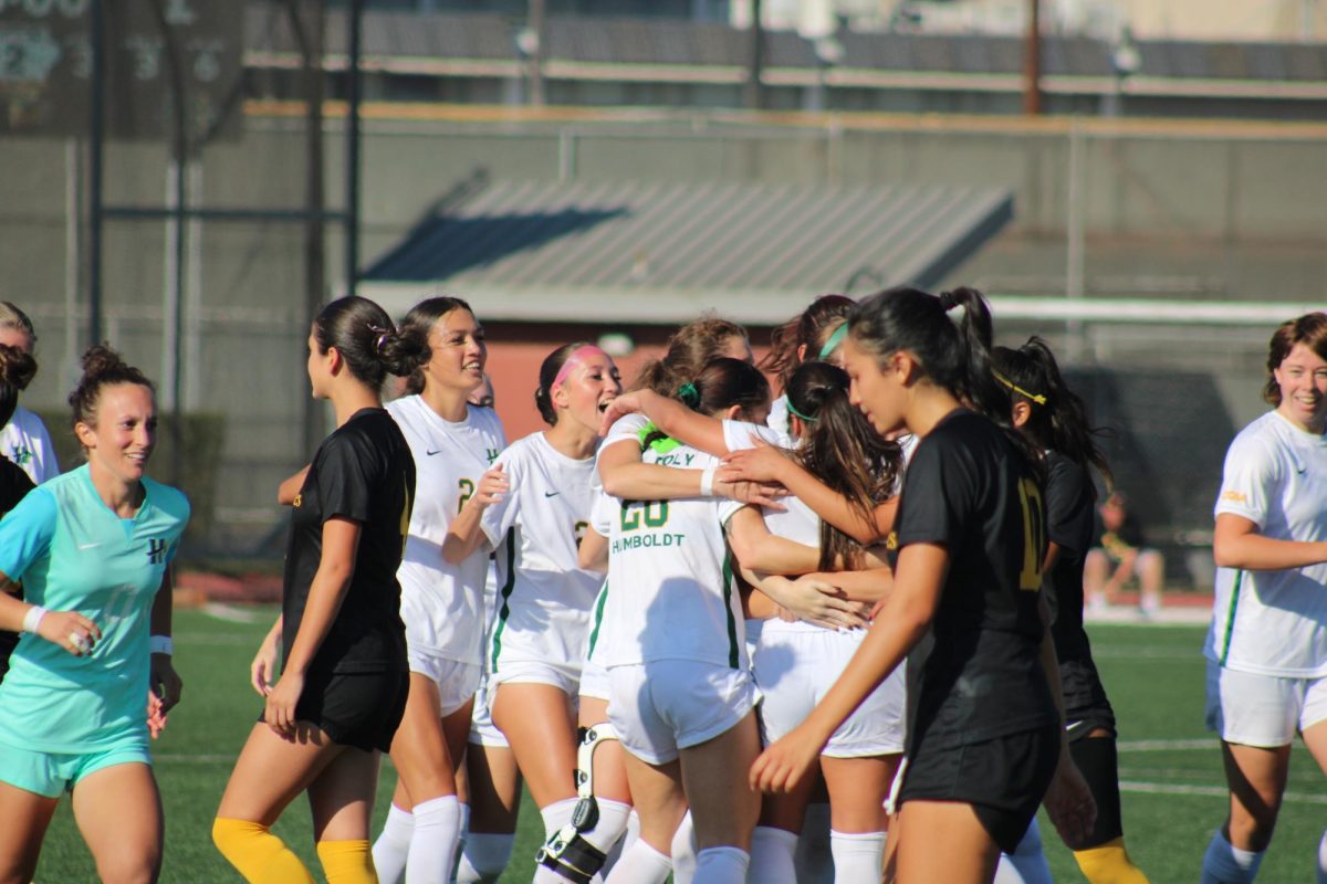 The Golden Eagles walk off the field as Cal Poly Humboldt players celebrate their 1-0 victory on Sunday, Oct. 13, 2024.