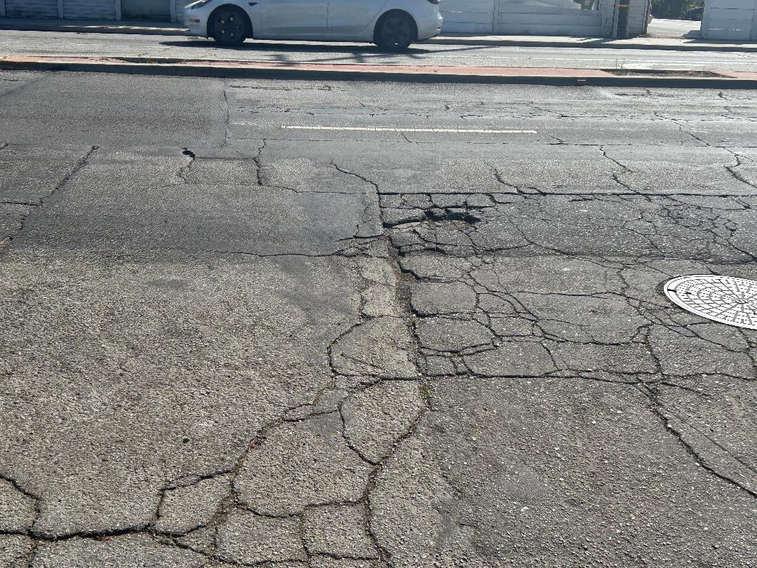 Infrastructure issues like pothole-ridden streets require Compton drivers to get new tires often, and the costs add up. Photo by Leslie Hudson