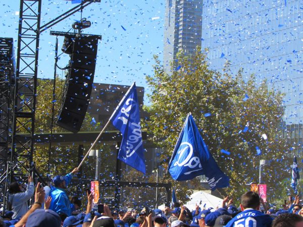 Confetti flies as fans celebrate the Dodgers' World Series victory  at the Dodgers parade in Downtown Los Angeles on Friday, Nov. 1. 