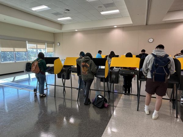 Cal State LA students cast their votes in the voting center at the University-Student Union on Monday, Nov. 4.