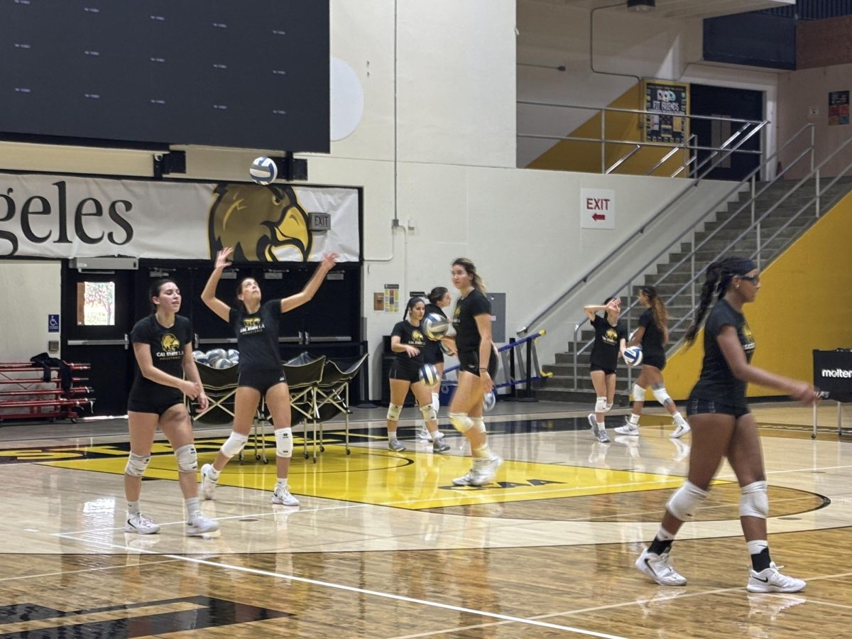 Cal State LA's women's volleyball team work on serves during practice on Tuesday, Dec. 3, 2024.