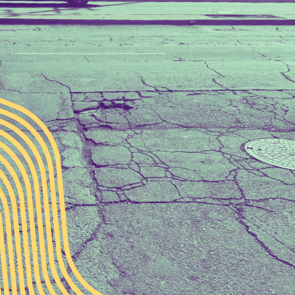 A cracked street with potholes, re-colorized with green tint with a yellow graphic of waves in a waterfall shape on the left.