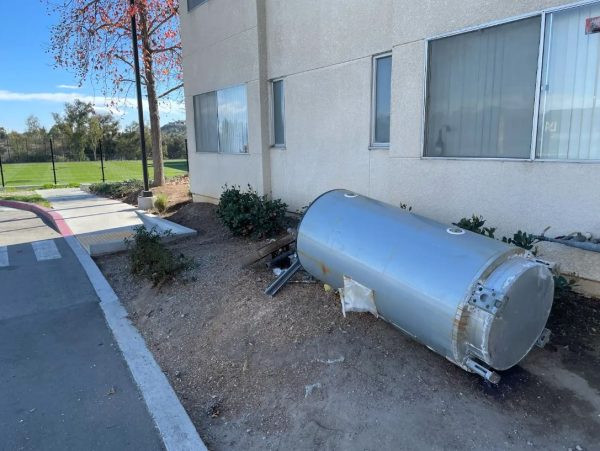 Hot water tank outside campus housing on Jan. 7, 2025. Students allege that there was no hot water in some units, highlighting ongoing maintenance concerns.