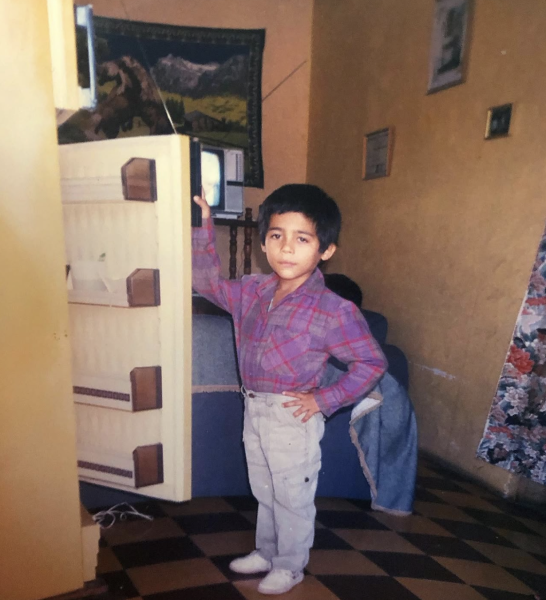 boy opening fridge