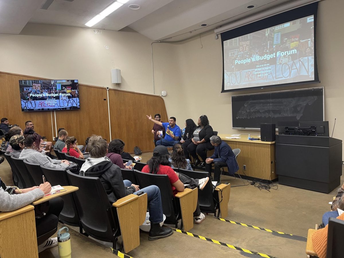 Kenneth Castillo, a CSULA faculty member, delivers a speech while participating in a panel at the People's Budget Forum.