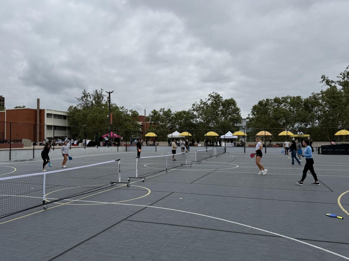 The Cal State LA women's tennis team plays pickleball during the courts' grand opening on April 16, 2025.