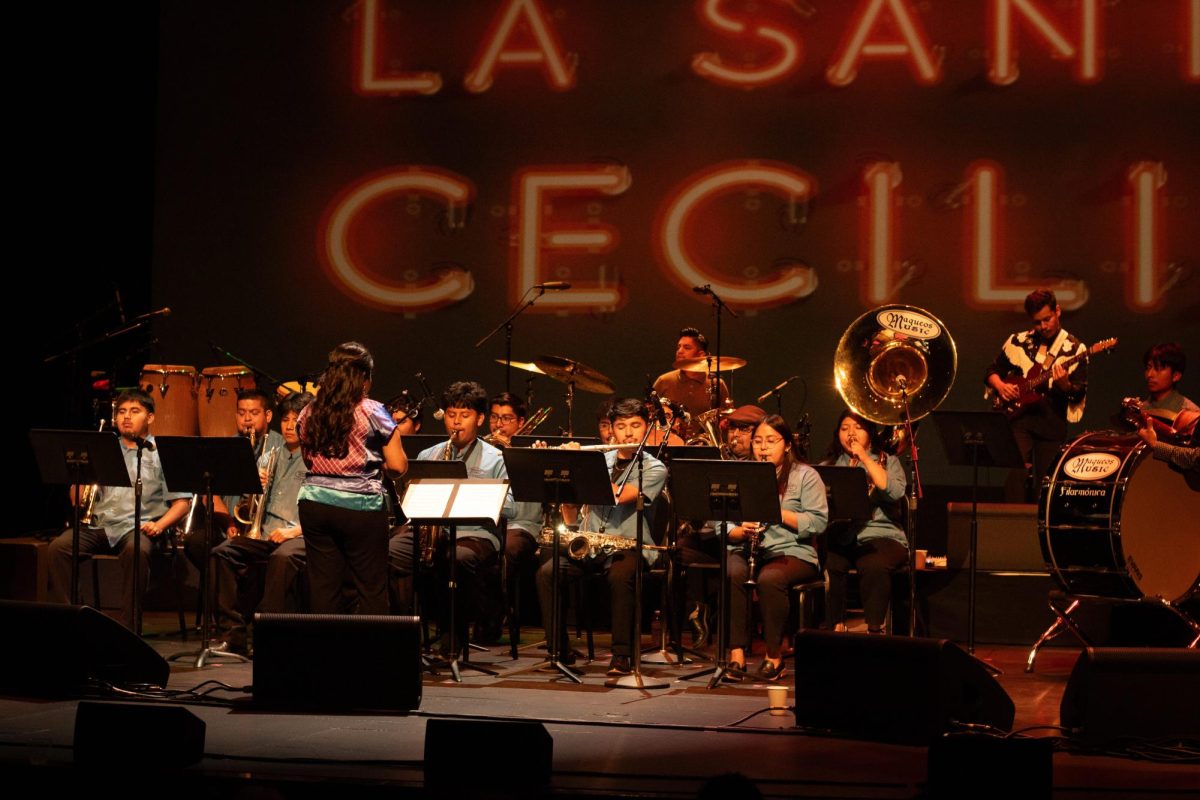 As a special surprise, students from Maqueos Music Academy joined La Santa Cecilia on stage for a live rendition of “Hojas en el Aire.”