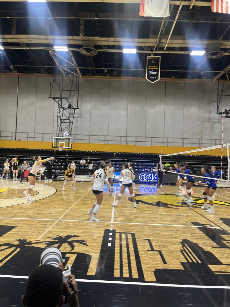 Outside hitter Zuhal Cetin serving the ball to her teammates