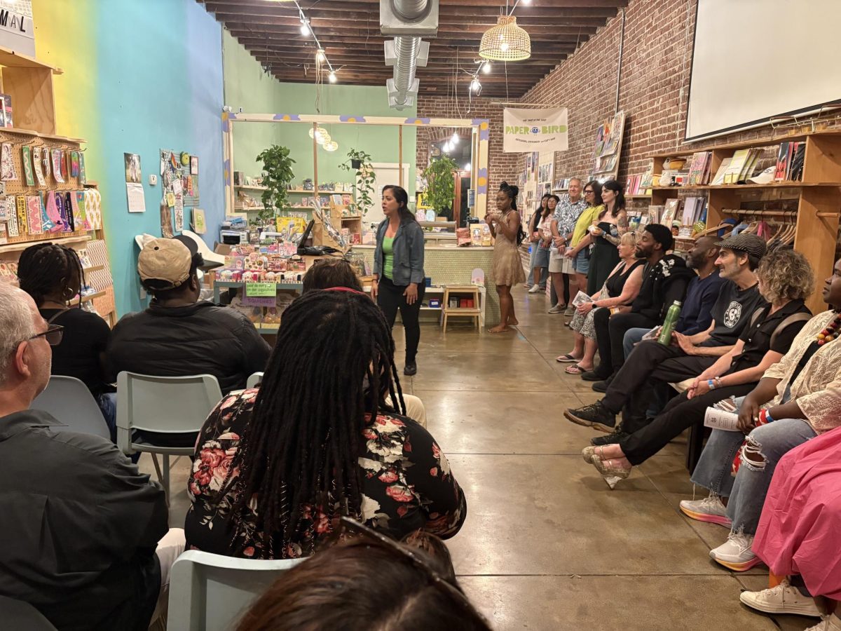 A scene from "Driving Straight" starring Melissa Lugo (front left), and Liv Jones (back right) inside be Nice Have Fun a business in Highland Park. Photo courtesy of Jesse Bliss