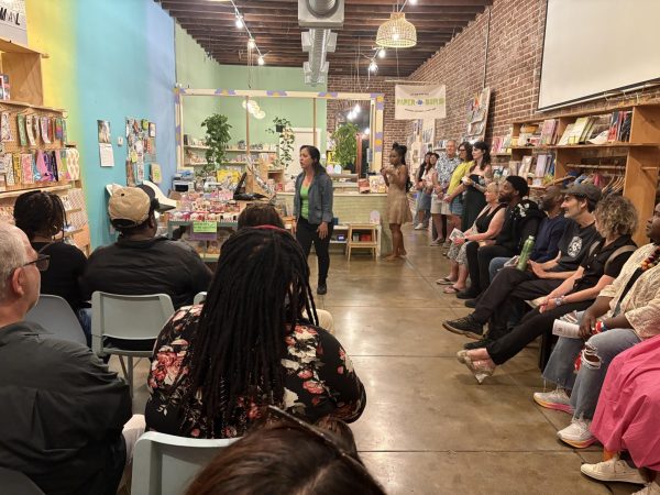 A scene from "Driving Straight" starring Melissa Lugo (front left), and Liv Jones (back right) inside be Nice Have Fun a business in Highland Park. Photo courtesy of Jesse Bliss