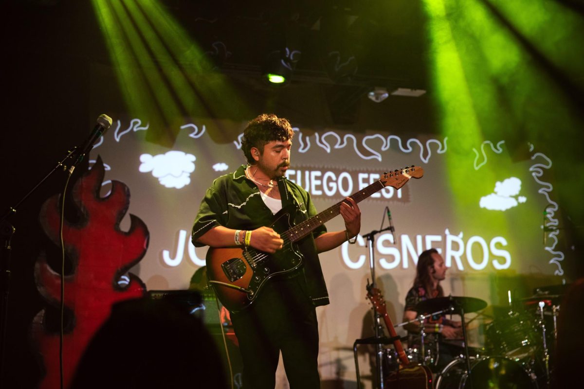 Musician Johnny Cisneros performs at Fuego-Fest inside the Echo on Sept. 20, 2025, captivating the crowd with his blend of Latin and indie sounds.