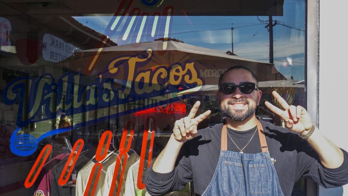 A photo of Victor Villa outside Villa's Tacos.