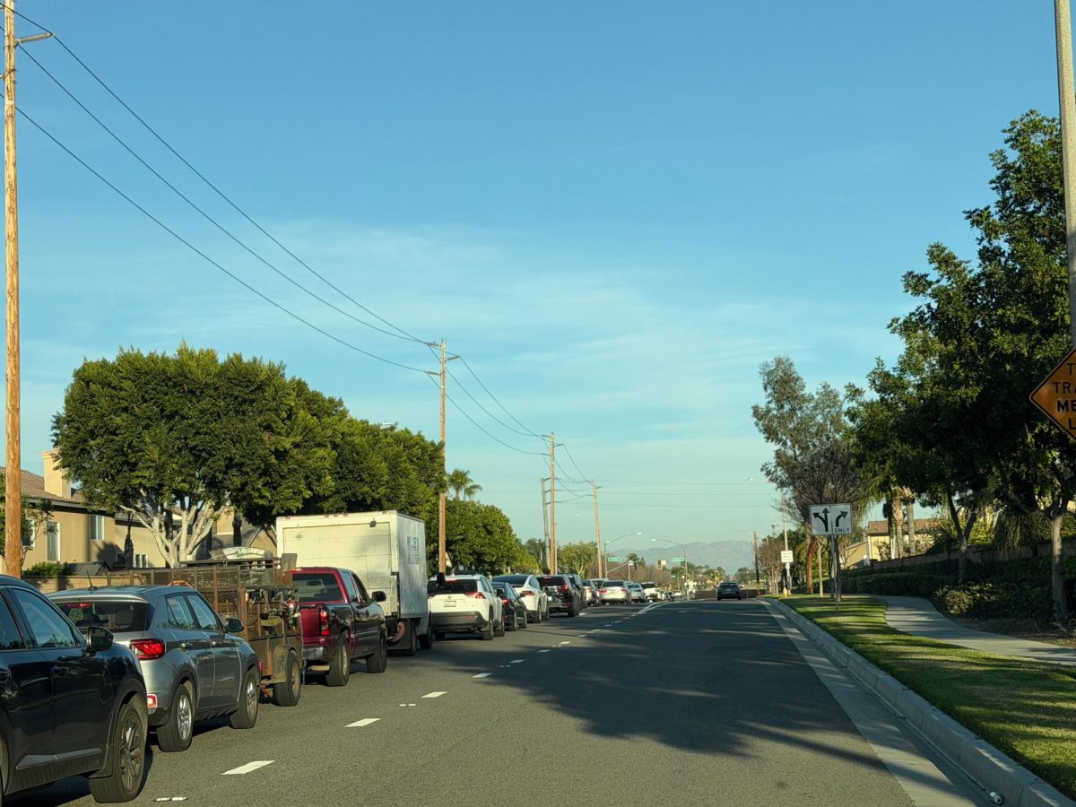 Traffic builds during rush hour on the intersection of Harrison Avenue and Sumner Avenue in Eastvale in late February.
